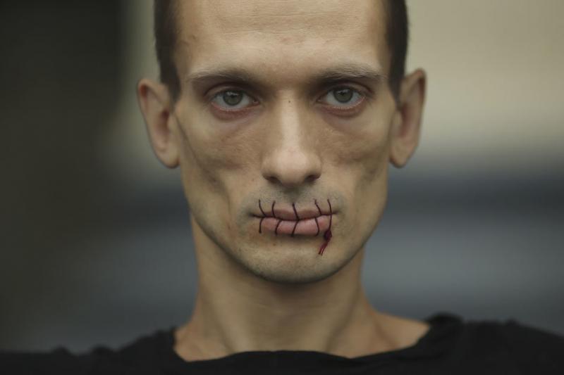 mouth sewed up to protest