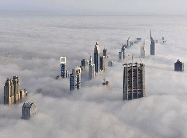 Skyscrapers shrouded in fog, Dubai.