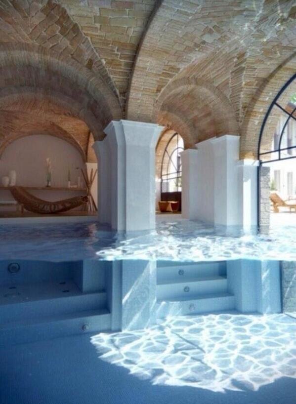 Indoor to outdoor glass pool