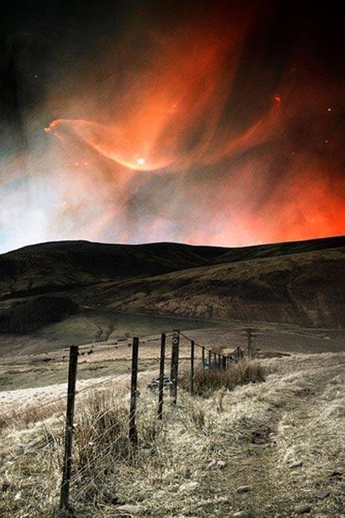 Orange aurora borealis above Iceland