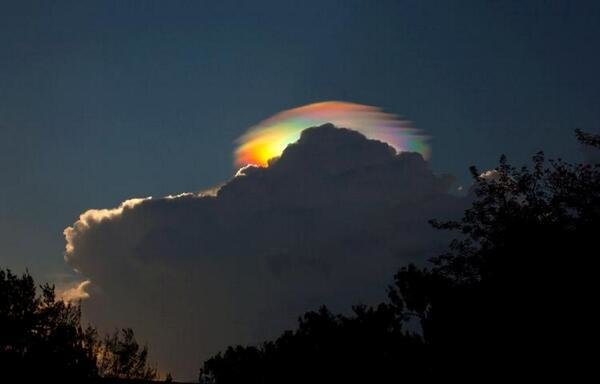 An extremely rare rainbow-colored pileus iridescent cloud over Ethiopia