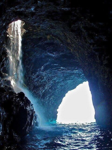 Sea cave waterfall Hawaii