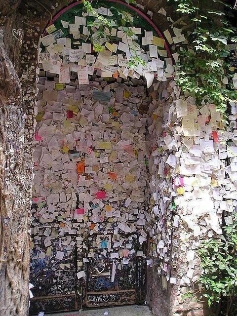 Wall of Love, Verona, Italy. People left notes on the entrance of Romeo and Juliet
