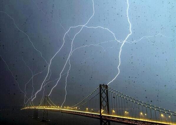 8 lightning bolts striking the San Francisco Bay Bridge at the same time