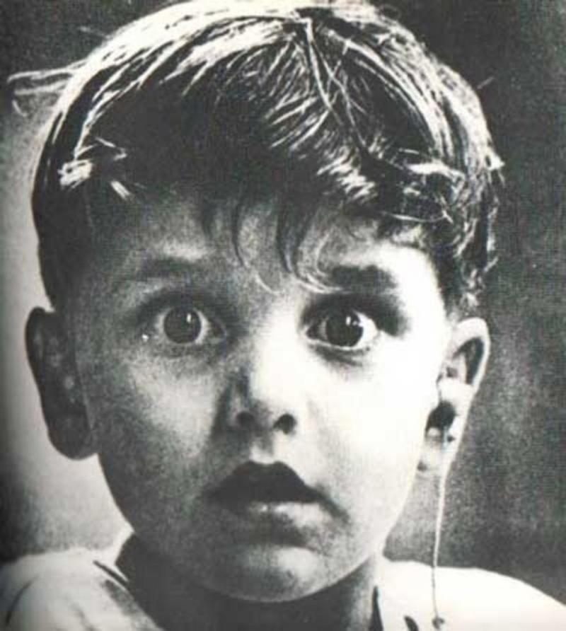 Harold Whittles hears for the first time ever after a doctor places an earpiece in his left ear