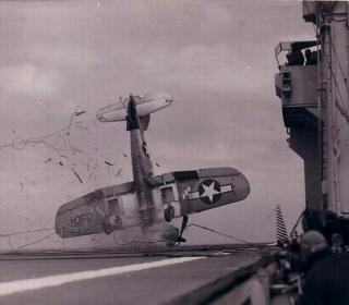 A crash on board an aircraft carrier sometime during World War II
